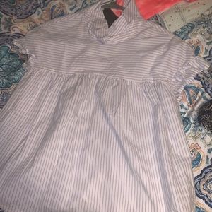 White and blue striped blouse